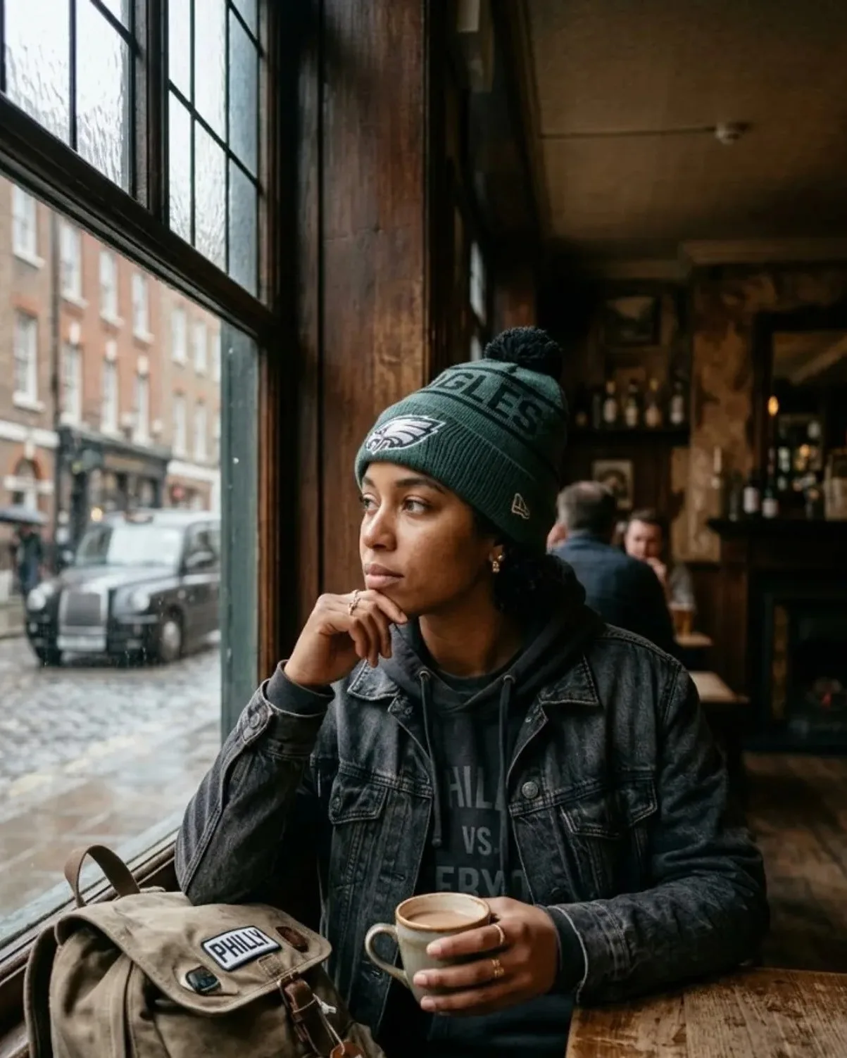 Editorial portrait plate for Episode 05: a single traveler at dawn, international week. Designed placeholder — not a photograph of London or Philadelphia landmarks.